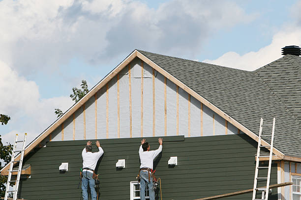 Professional Siding Replacement technician working in Highland, NY